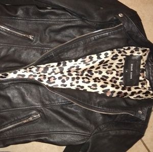 Black rivet genuine leather moto jacket.